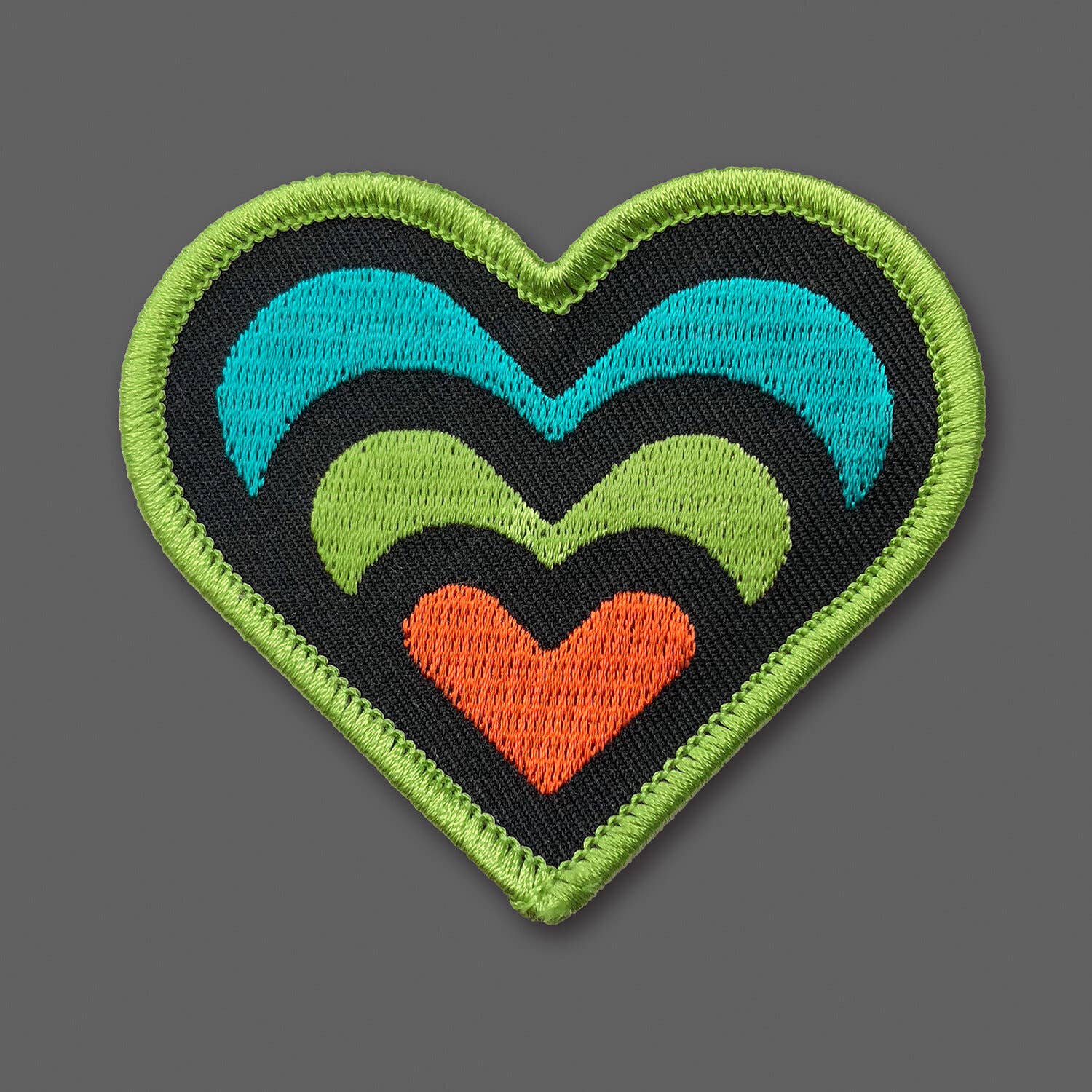 Expanding Heart Black/Green Patch